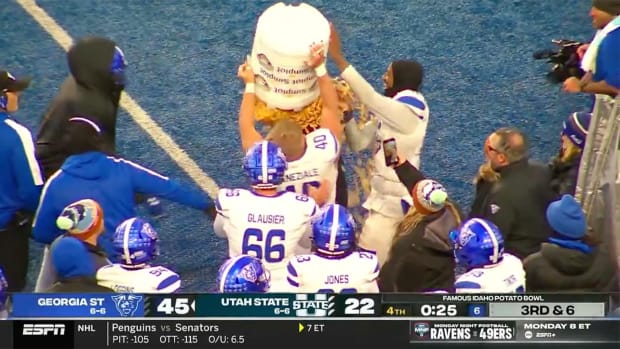 Georgia State players douse their coach in french fries.